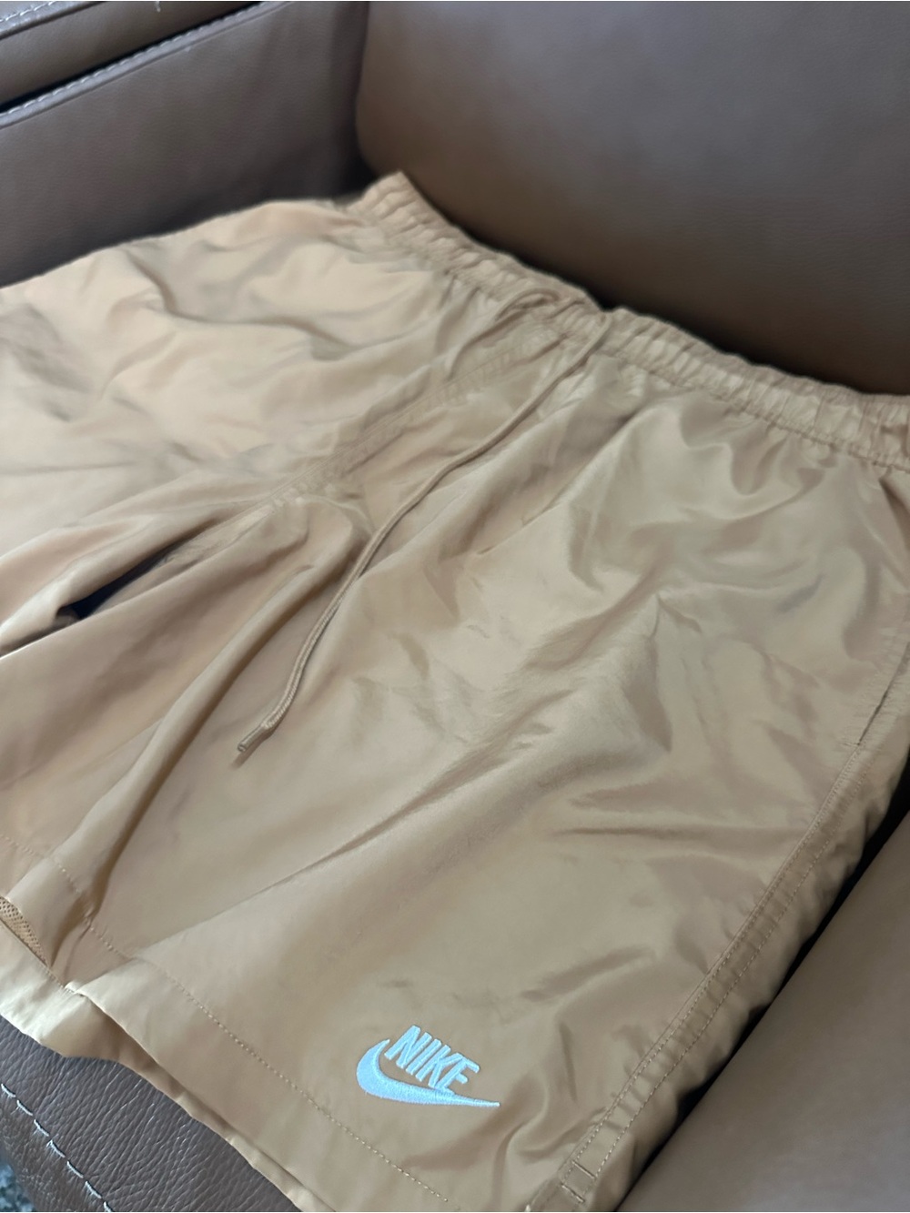 Nike Men’s Tan Athletic Shorts with White Logo